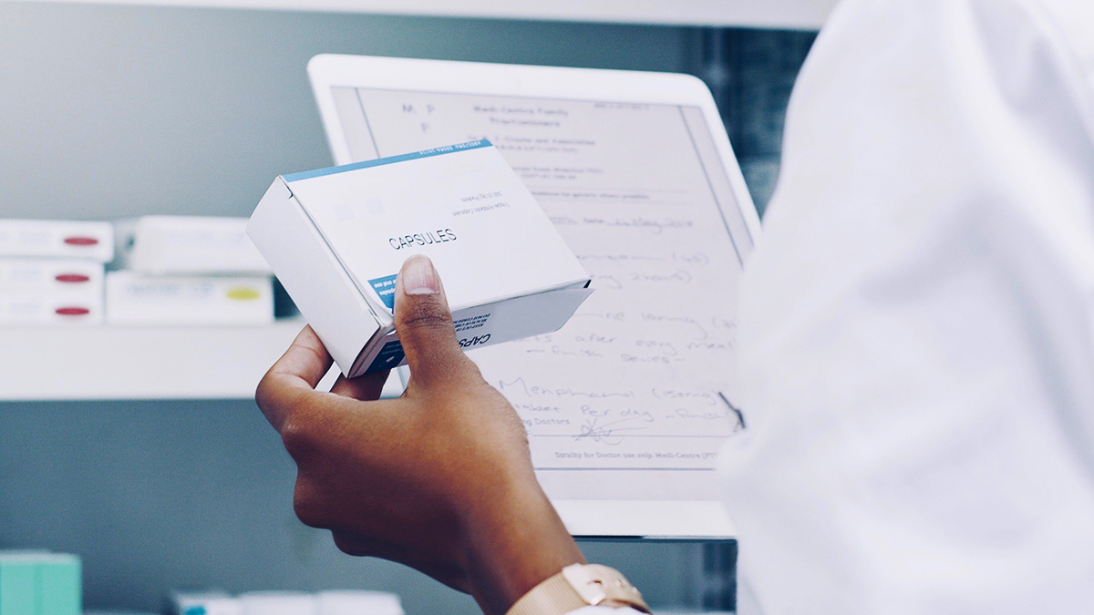 pharmacist looking at medication