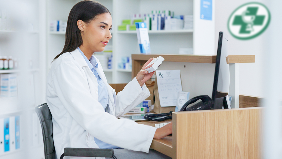 pharmacist checking medication