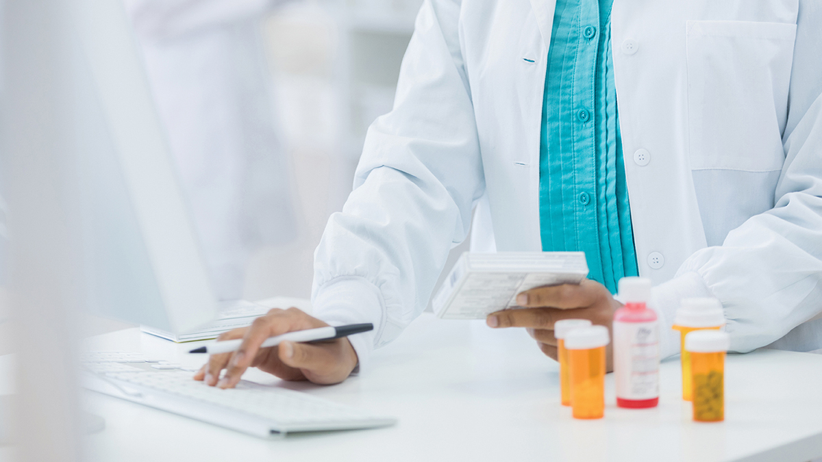 pharmacist with medications