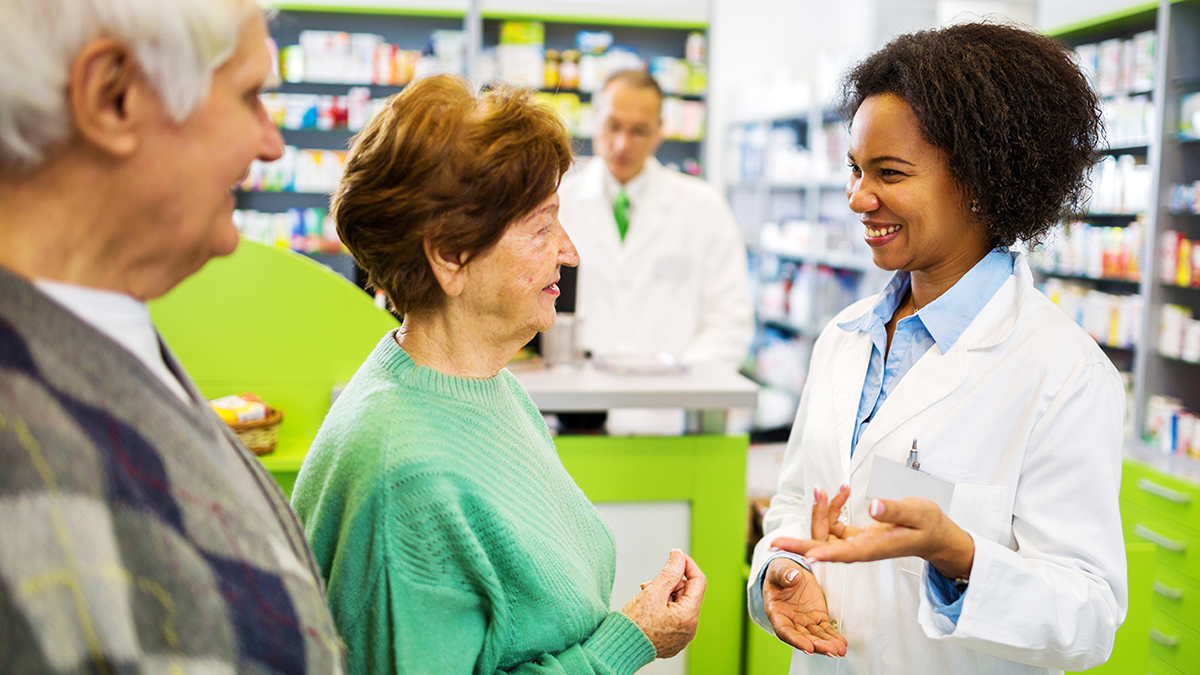 pharmacist with patients
