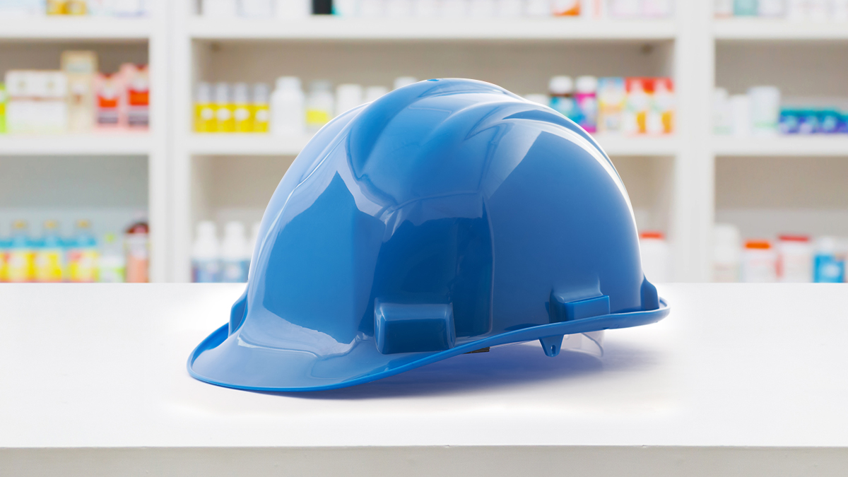 hard hat on a pharmacy counter