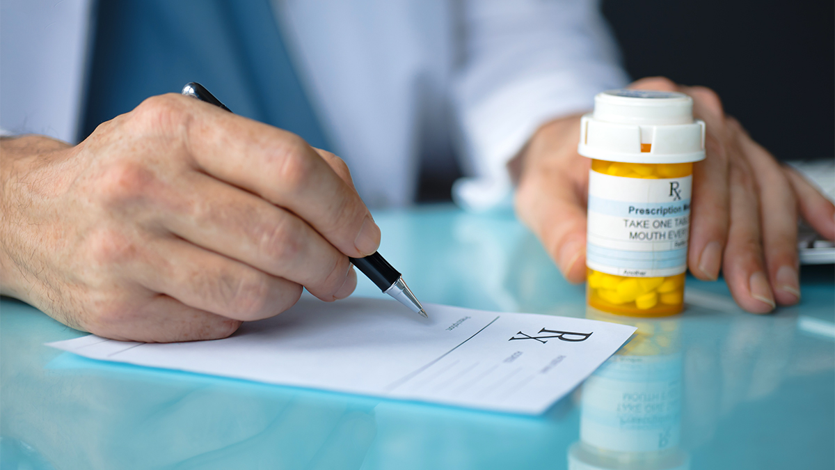 pharmacist with prescription