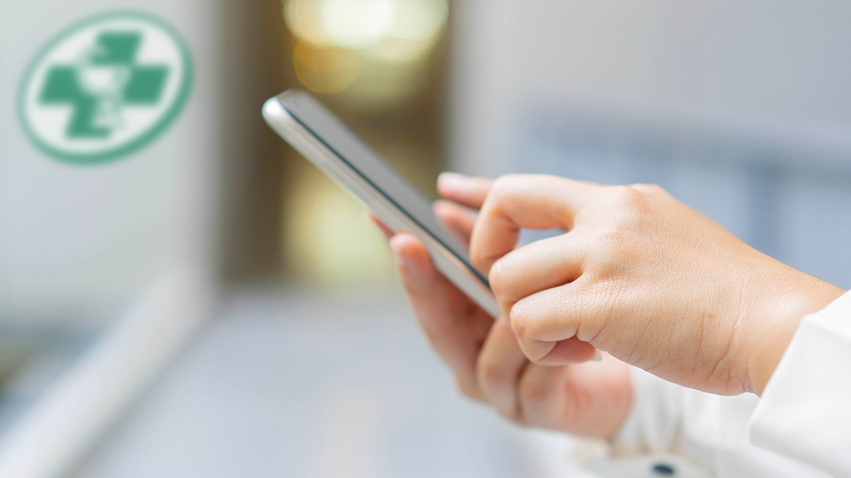 pharmacist on mobile device