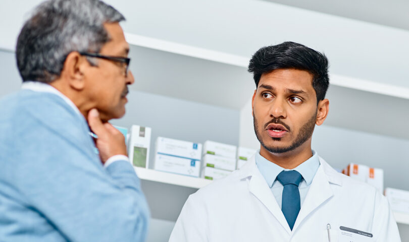 pharmacist with patient