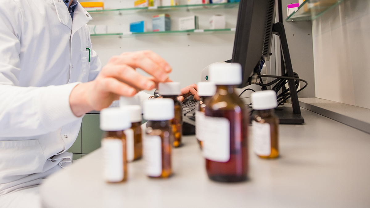 pharmacist with medications