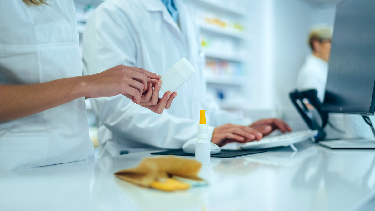pharmacist checking medication
