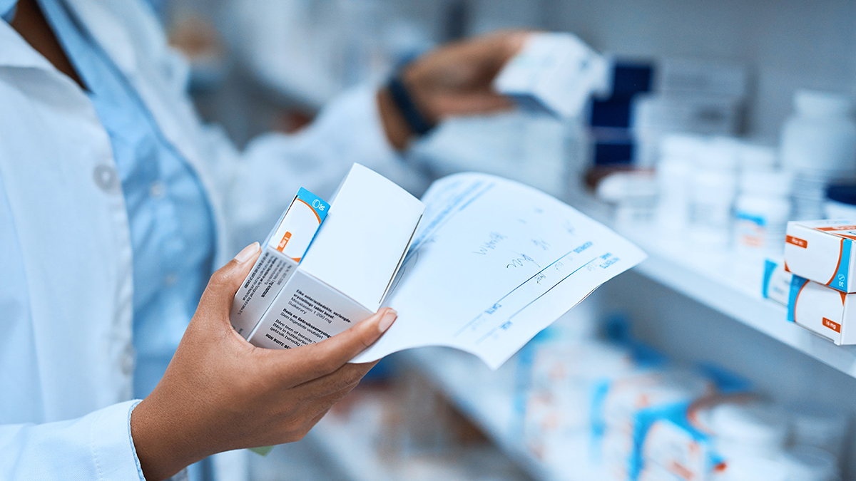 shot of a pharmacist filling a prescription