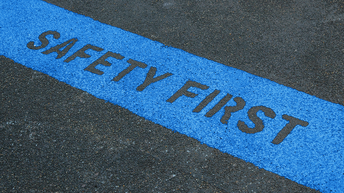 words safety first on pavement