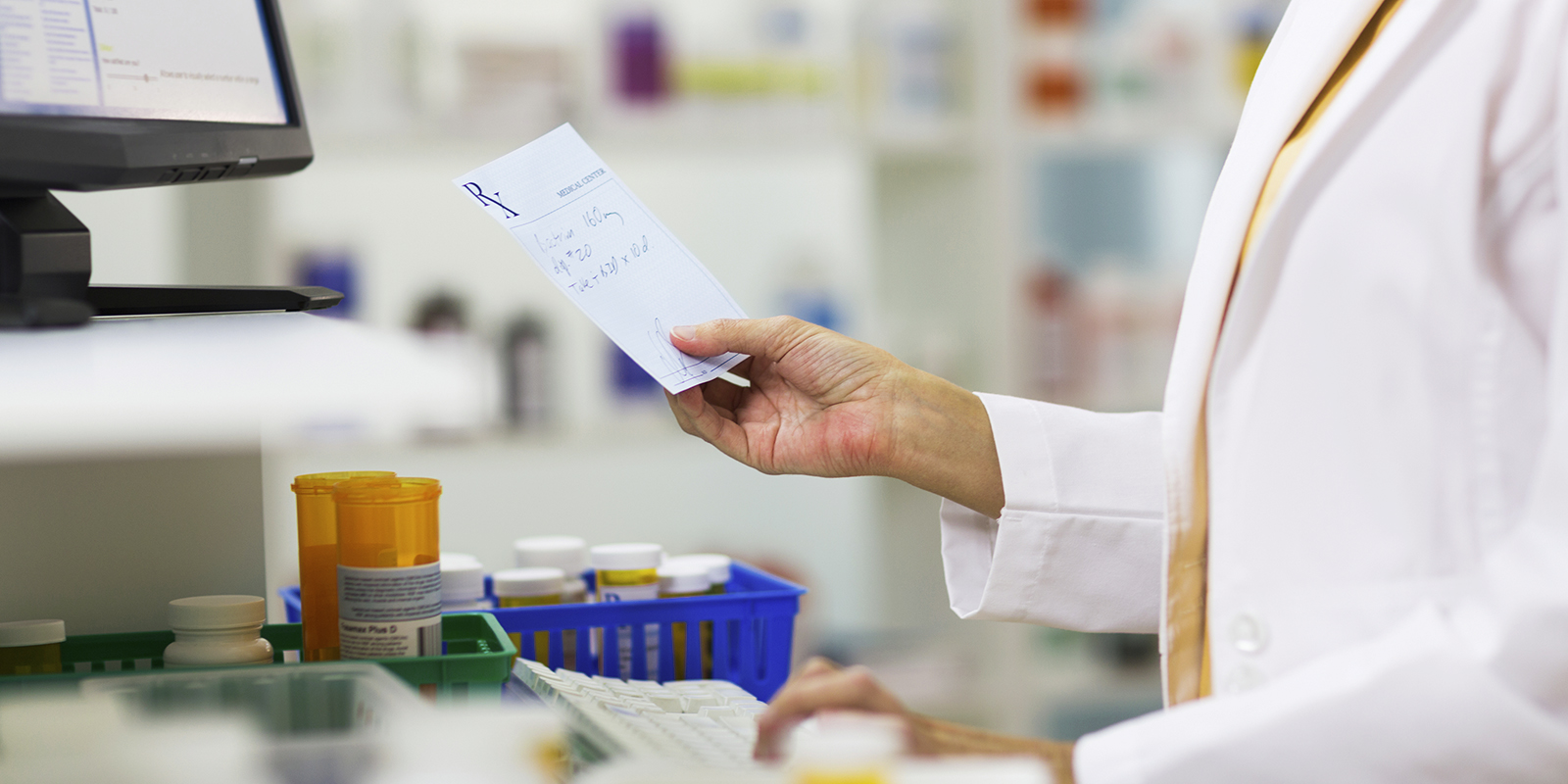 A pharmacists fulfilling a prescription