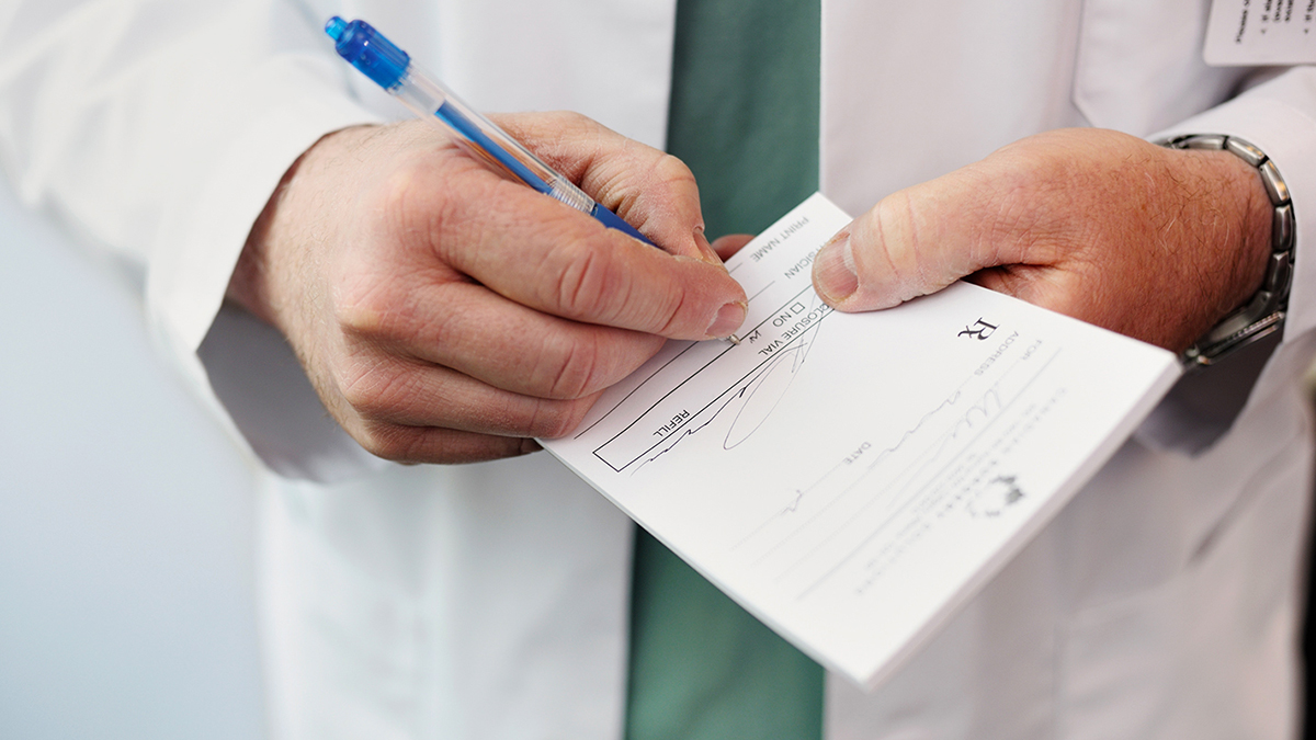 pharmacist with prescription