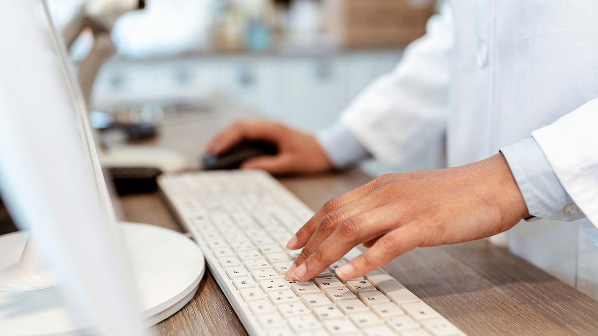 pharmacist at computer