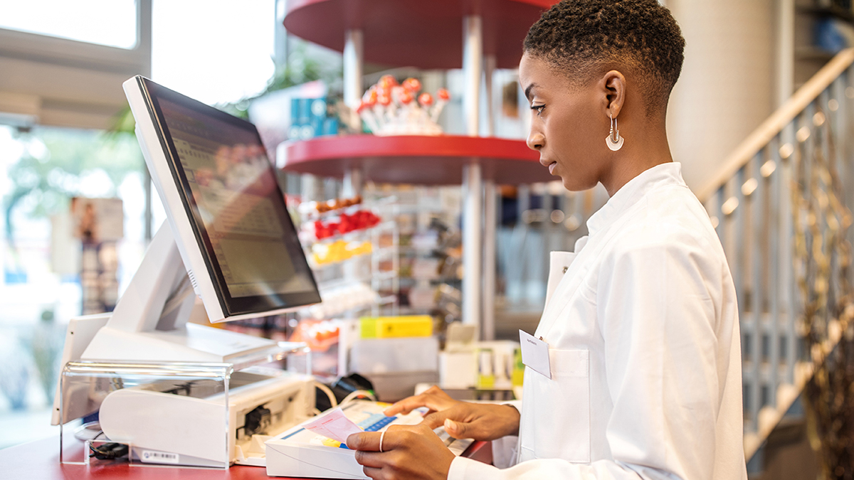 pharmacist at computer