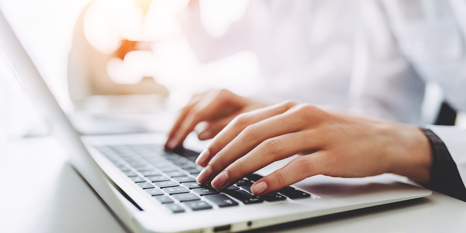 pharmacist at keyboard