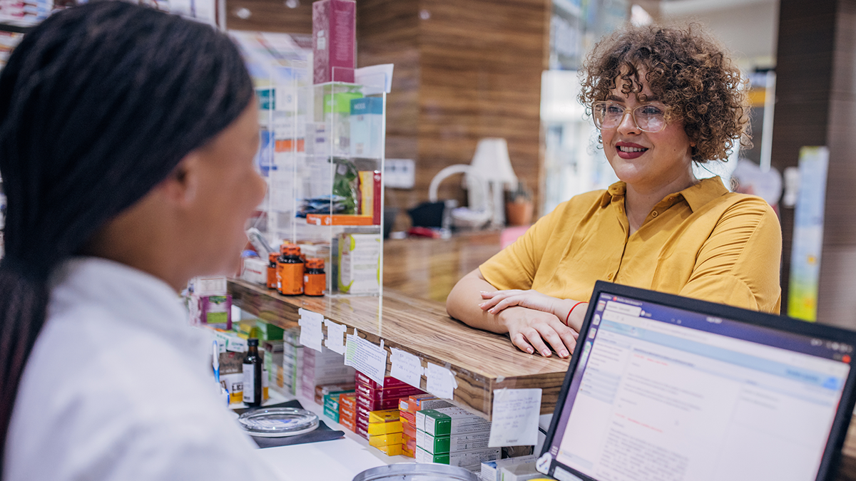 pharmacist talking with a patient